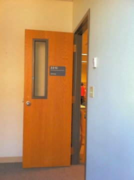 Image of an open office door titled Doors: Walk Through Them